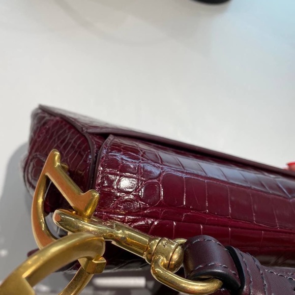 Metallic Burgundy Shiny Alligator Saddle Bag Gold
Hardware - Picture 8 of 11